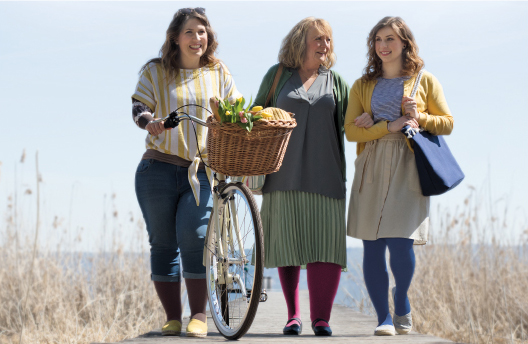 three women wearing compression garments walking in the outdoors